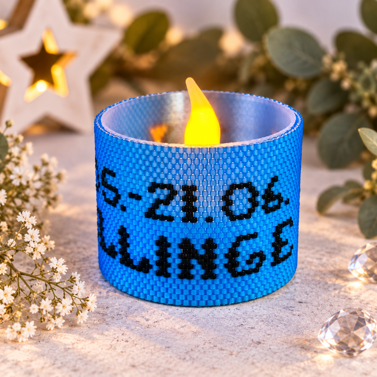 Windlichtumrandung Zwillinge aus blauen Perlen mit Enddatum 21.06. und restlichem Schriftzug Zwillinge